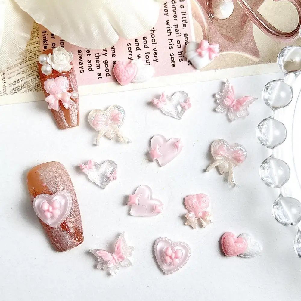 새로운 핑크 시리즈 보우 하트 수지 네일 매력 3D 빛나는 더블 나비 복숭아 하트 달콤한 바람 네일 아트 장식 DIY 손톱