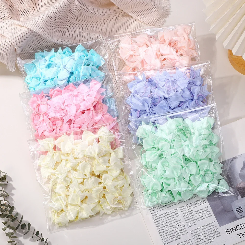 아기 활 10Pcs 새로운 색상 Grosgrain 리본 활 탄성 Hairties 헤어 밴드 여자 봄 머리 밧줄 헤어 액세서리 도매
