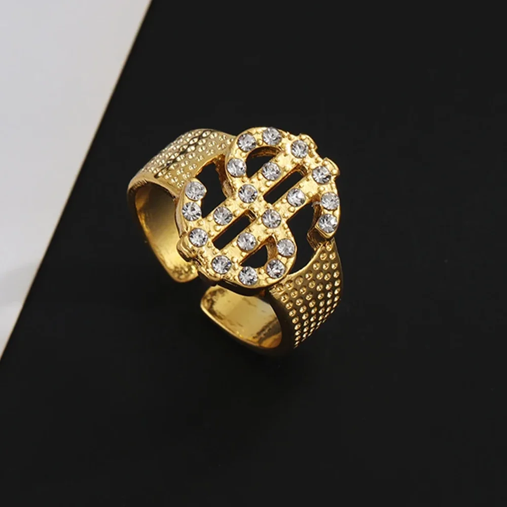 매력적인 골드 달러 사인 반지, 상감 라인석, 트렌디한 발렌타인 데이, 커플 쥬얼리 선물, 크기 조정 가능 title=매력적인 골드 달러 사인 반지, 상감 라인석, 트렌디한 발렌타인 데이, 커플 쥬얼리 선물, 크기 조정 가능 